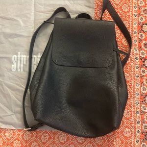 Street level vegan leather backpack.